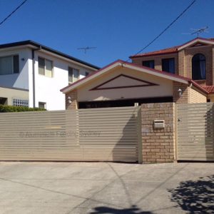 Aluminium Fencing Sydney horizontal slat sliding and pedestrian gates